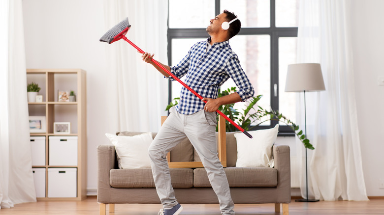 Man with broom