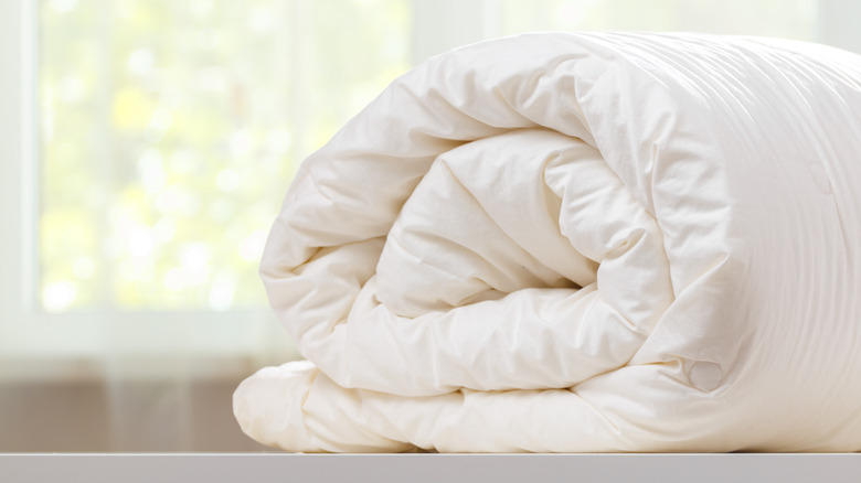 A rolled duvet