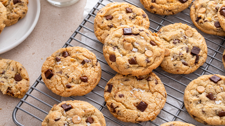 Close up of chocolate chip cookies cooling on baking rack