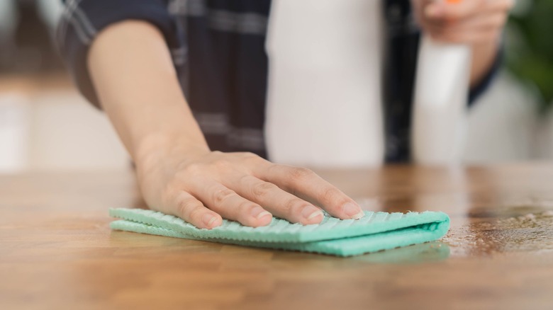 Washing wood work surface