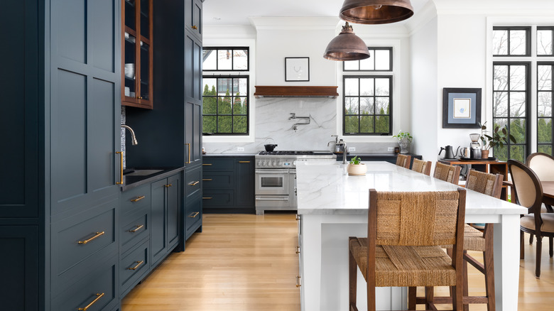 Kitchen with blue cabinetry