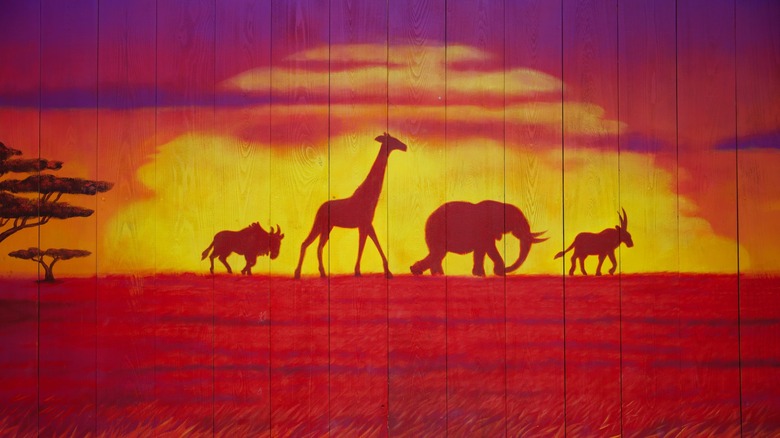 Disney mural on a fence