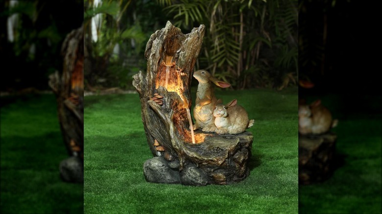 water fountain with rabbits