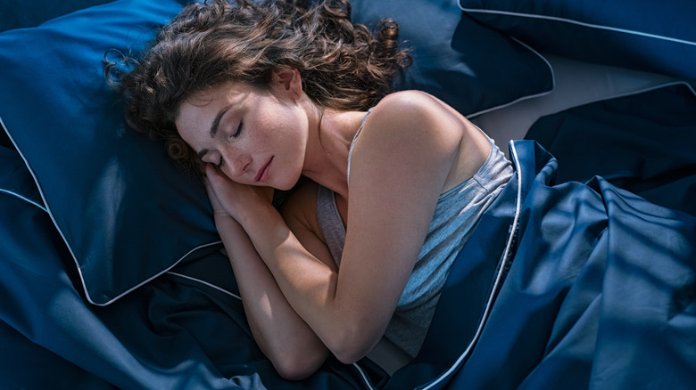 Woman resting in bed