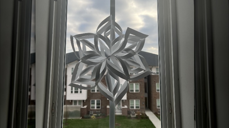 paper snowflake on window