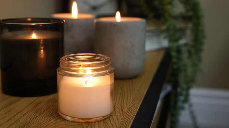 Lit candles on display