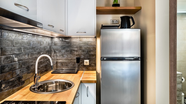 Tiny kitchen with wooden counters