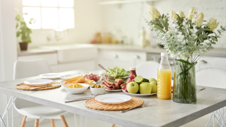 breakfast nook with food and flowers