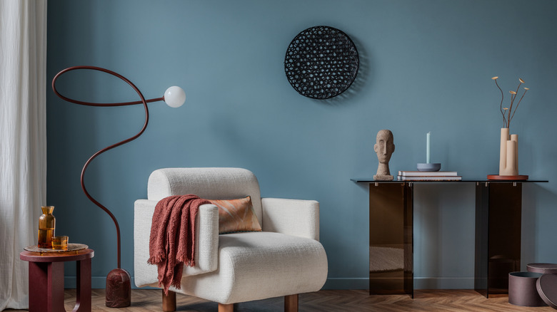 living room with blue accent wall