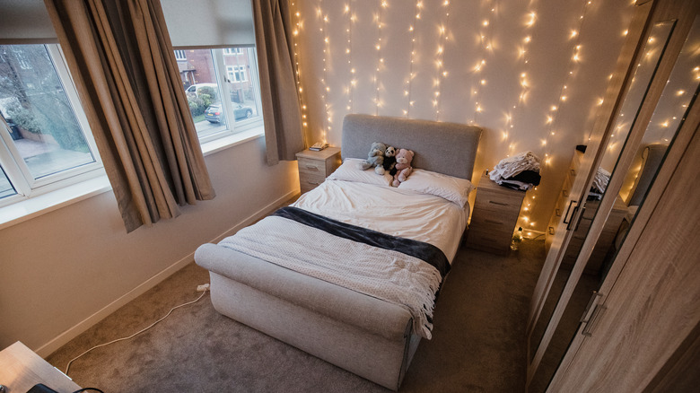 string lights behind bed