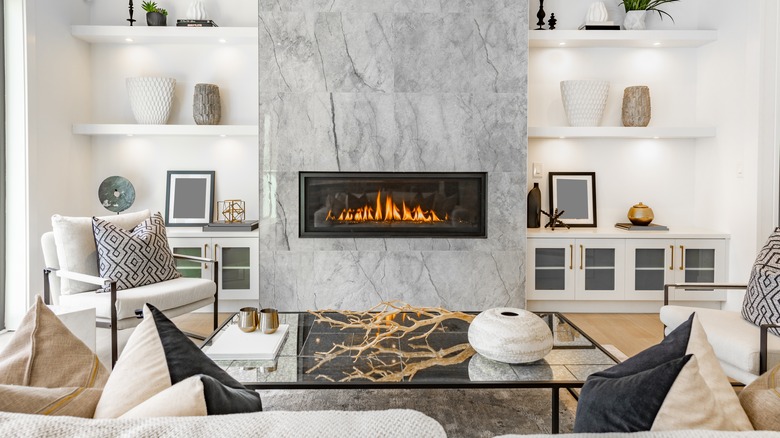 marble fireplace with floating shelves