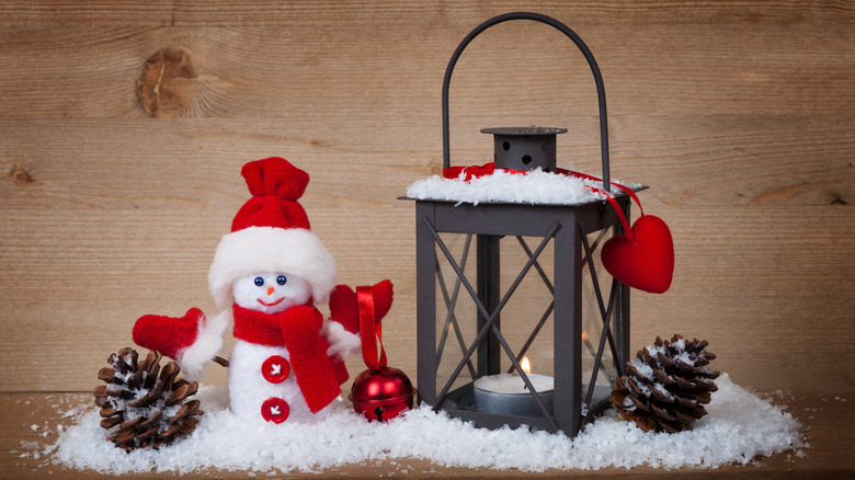 snowman and winter lantern design 