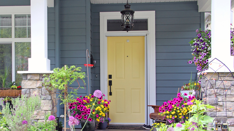 porch flowers and yellow door