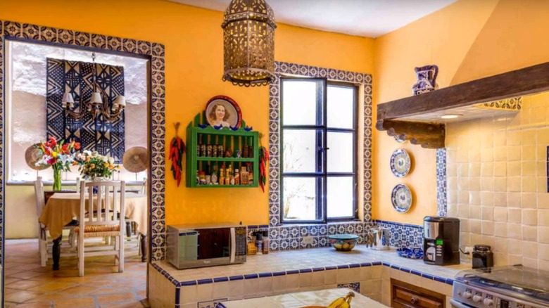 bright yellow Spanish style kitchen