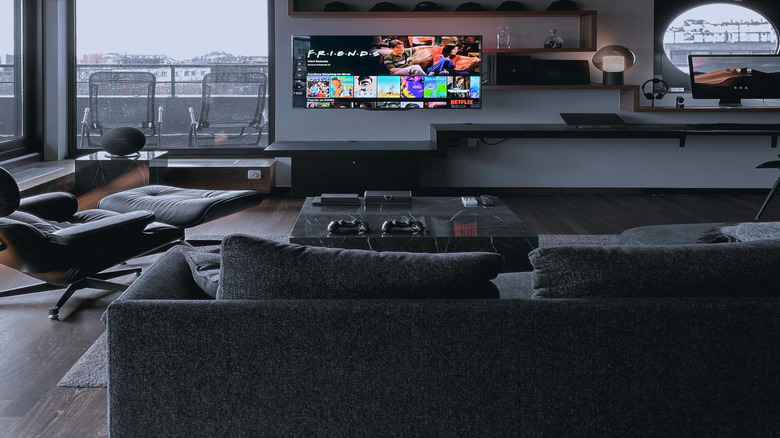 shelves and art by television