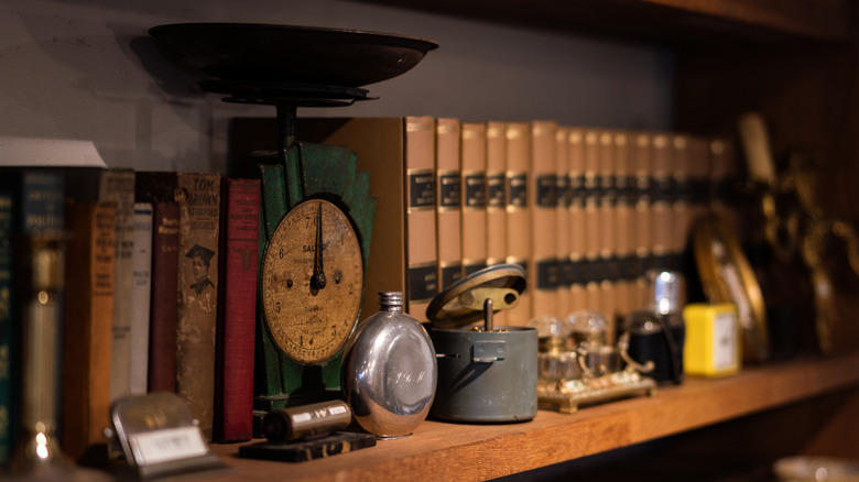 bookshelf with antiques