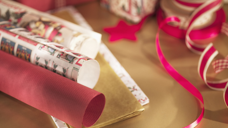 Wrapping paper and ribbon on a table.