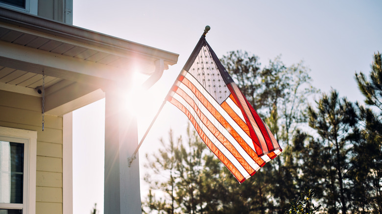 american flag on porch