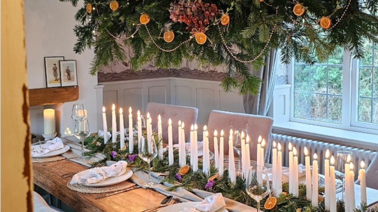 Tablescape with taper candles on on wood table