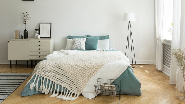 bedroom with blue bedding