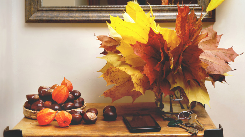 Leaves in jar on entry table