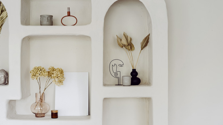 uniquely shaped ceramics on wall