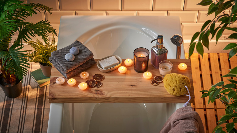 lit candles over the tub