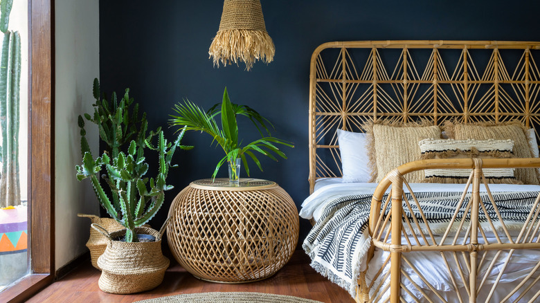 bohemian rattan bedroom with plants