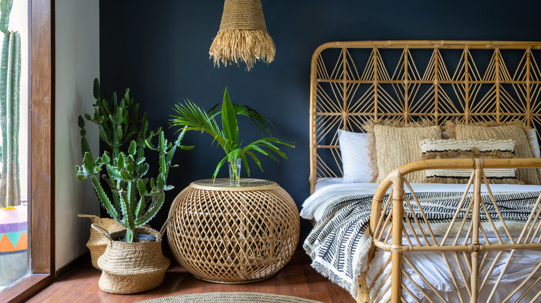 bohemian rattan bedroom with plants