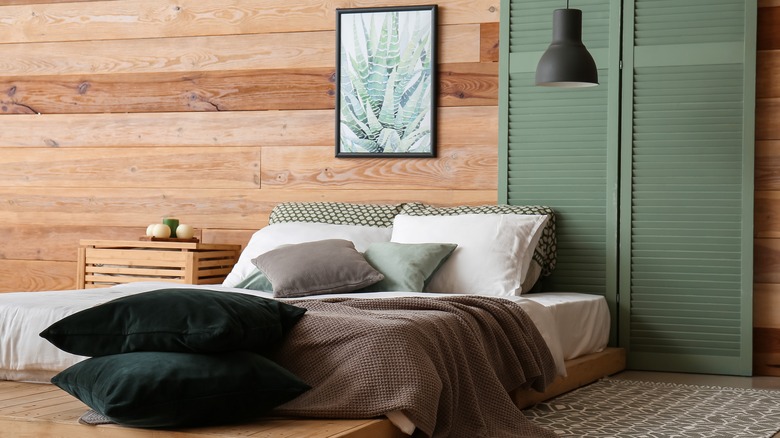 bedroom with sage green accent