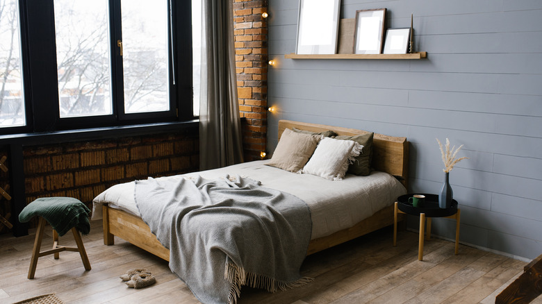bedroom decorated in light and dark tones