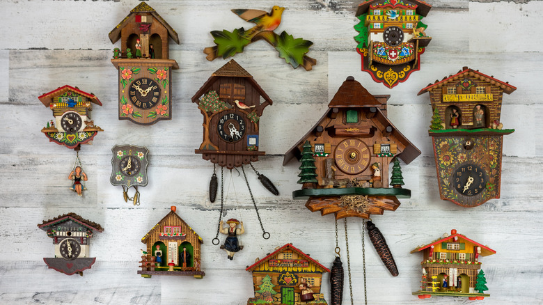 a collection of cuckoo clocks