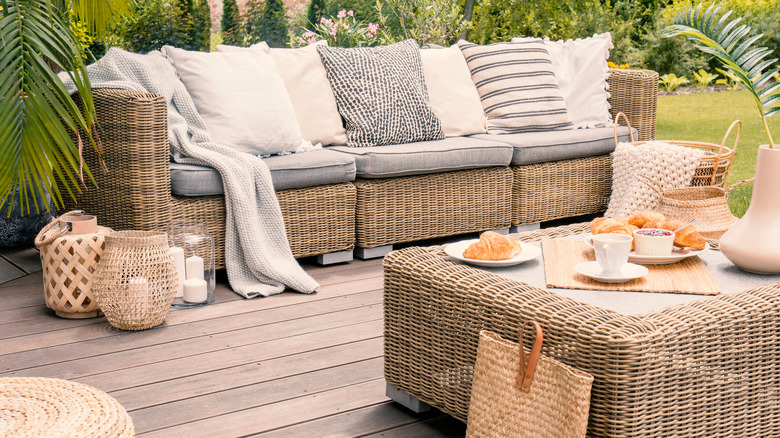 wicker furniture on wooden deck
