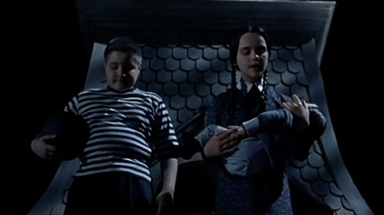 Wednesday and Pugsley Addams on the roof