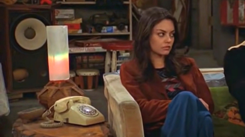 Mila Kunis on couch