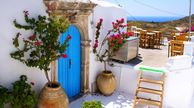 mediterranean villa with blue door
