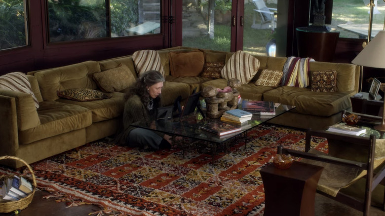 Frankie sitting on large rug