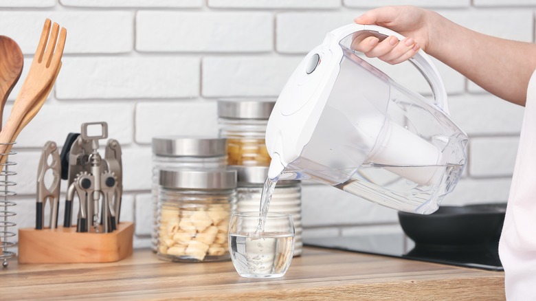 pouring water from Brita