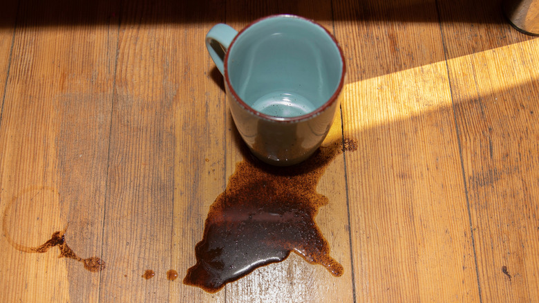 Coffee spilled on wood flooring
