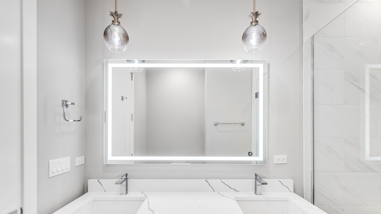 A brightly lit bathroom and LED mirror