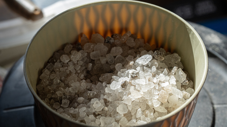 Bucket filled with rock salt
