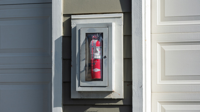 Fire extinguisher fixed to residential home