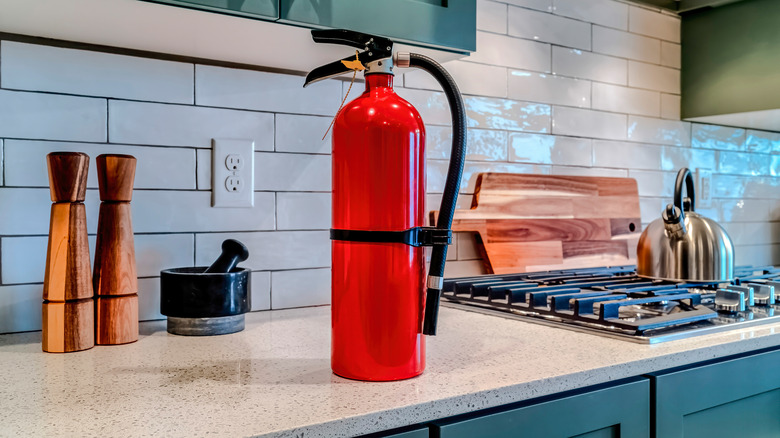 Fire extinguisher on kitchen counter