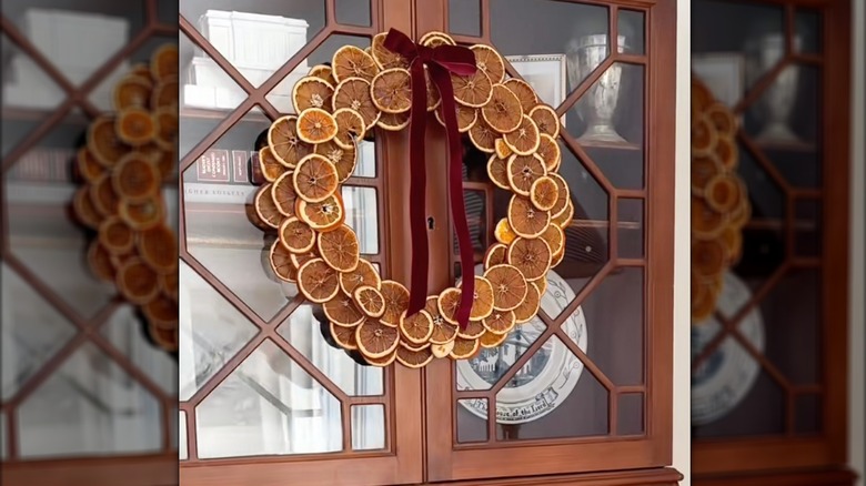 A DIY dried orange wreath for the door.