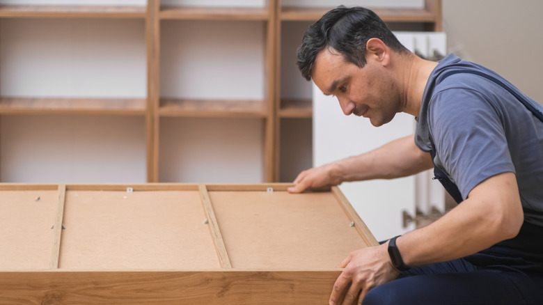 Hidden secret drawer in bookshelf