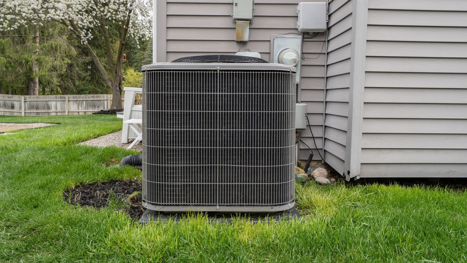 How To DIY A Stylish Fence To Cover An Unsightly HVAC Unit