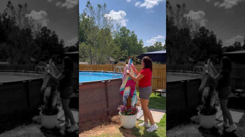 DIY towel rack in a planter pot