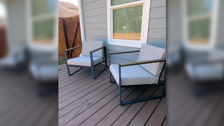 Two patio chairs with DIY gray cushions