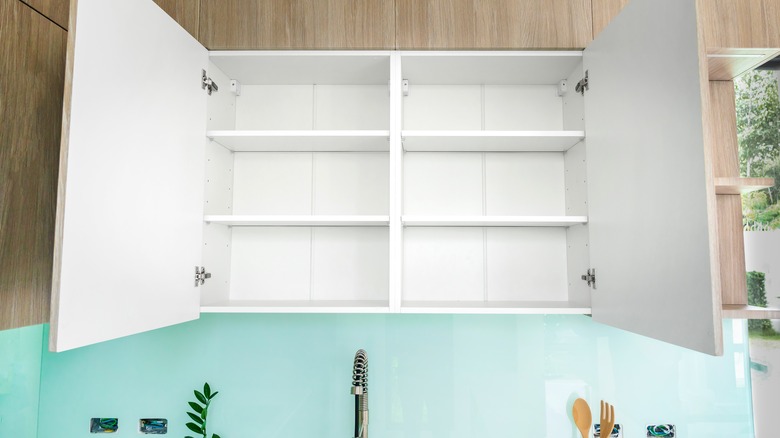 Kitchen cabinet with open doors