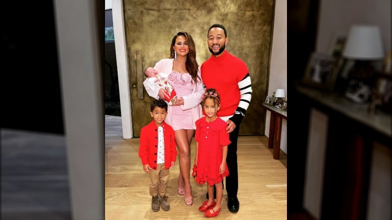 Chrissy Teigen and family smiling